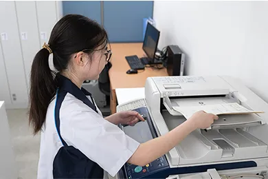 設計図をスキャンしている写真